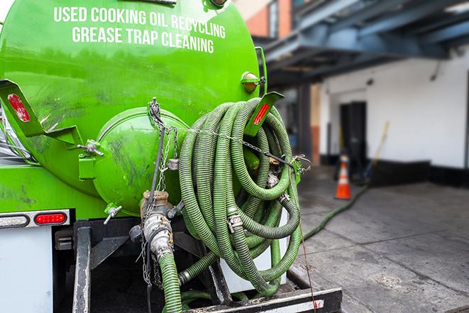 a pump truck emptying a grease trap in Montebello